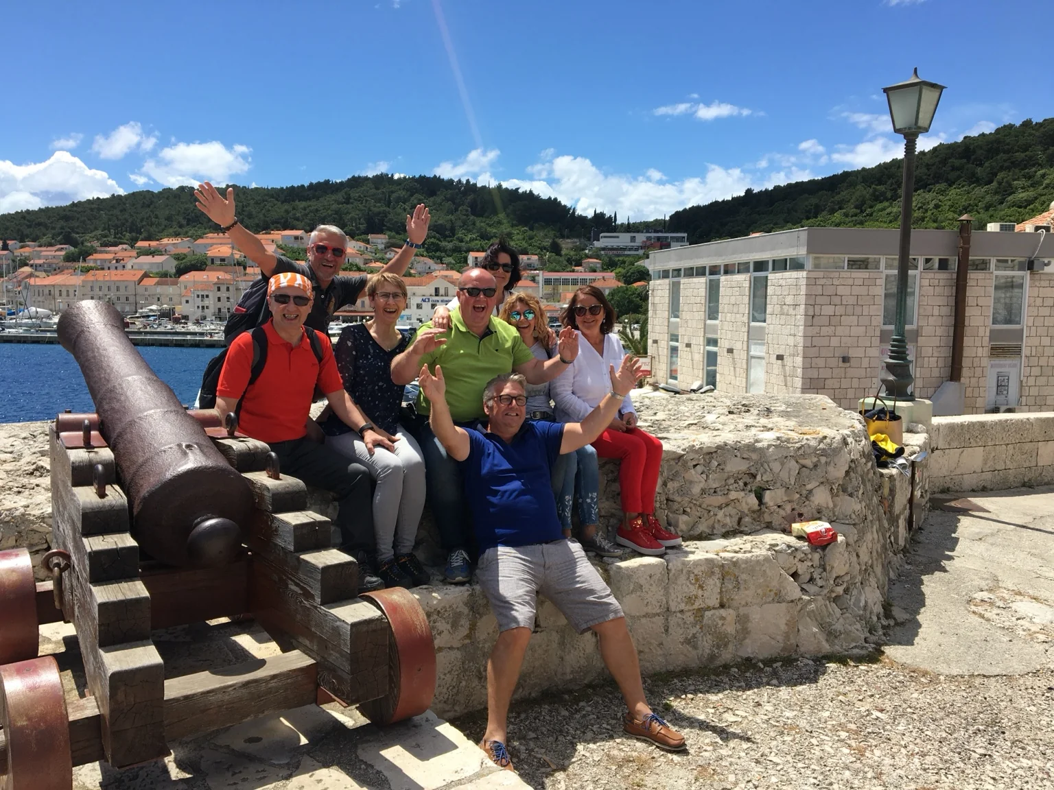 Guests stopping together in a historic Croatian town